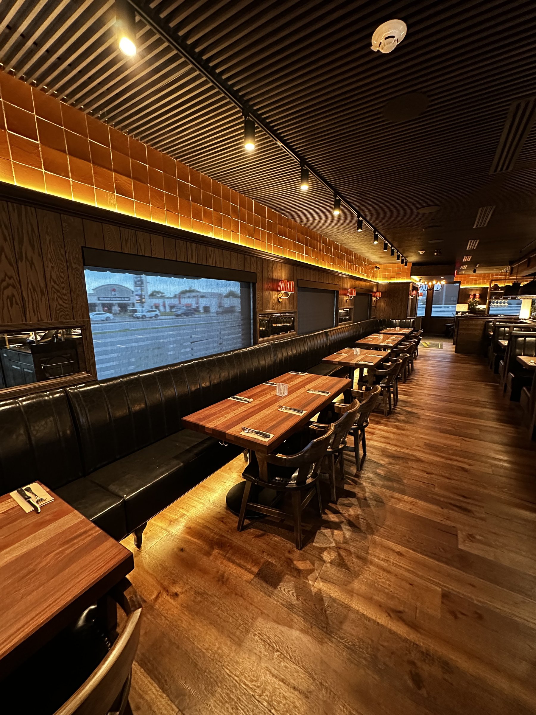 Booth seating under distributed Q-SYS audio coverage