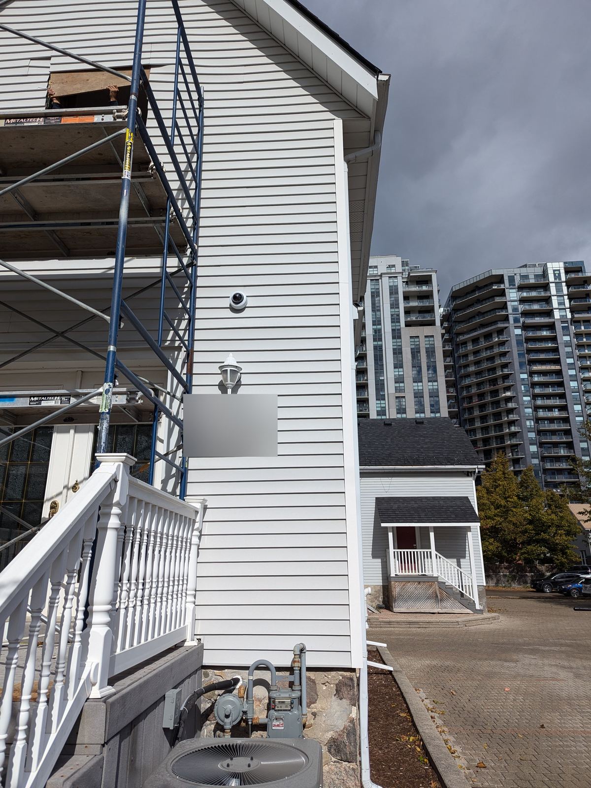 Dome camera on a commercial building side wall in uptown Waterloo