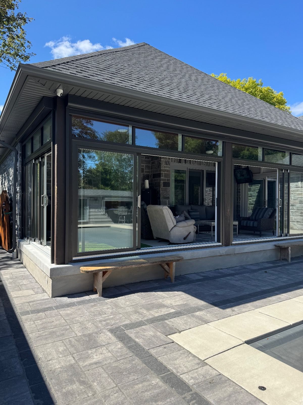 Soffit camera covering a pool house and patio