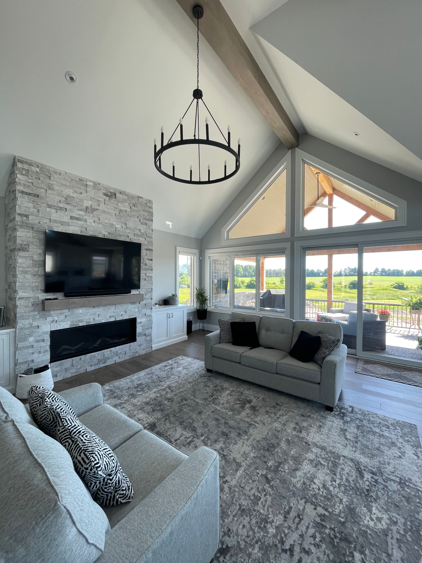 Vaulted great room with integrated TV