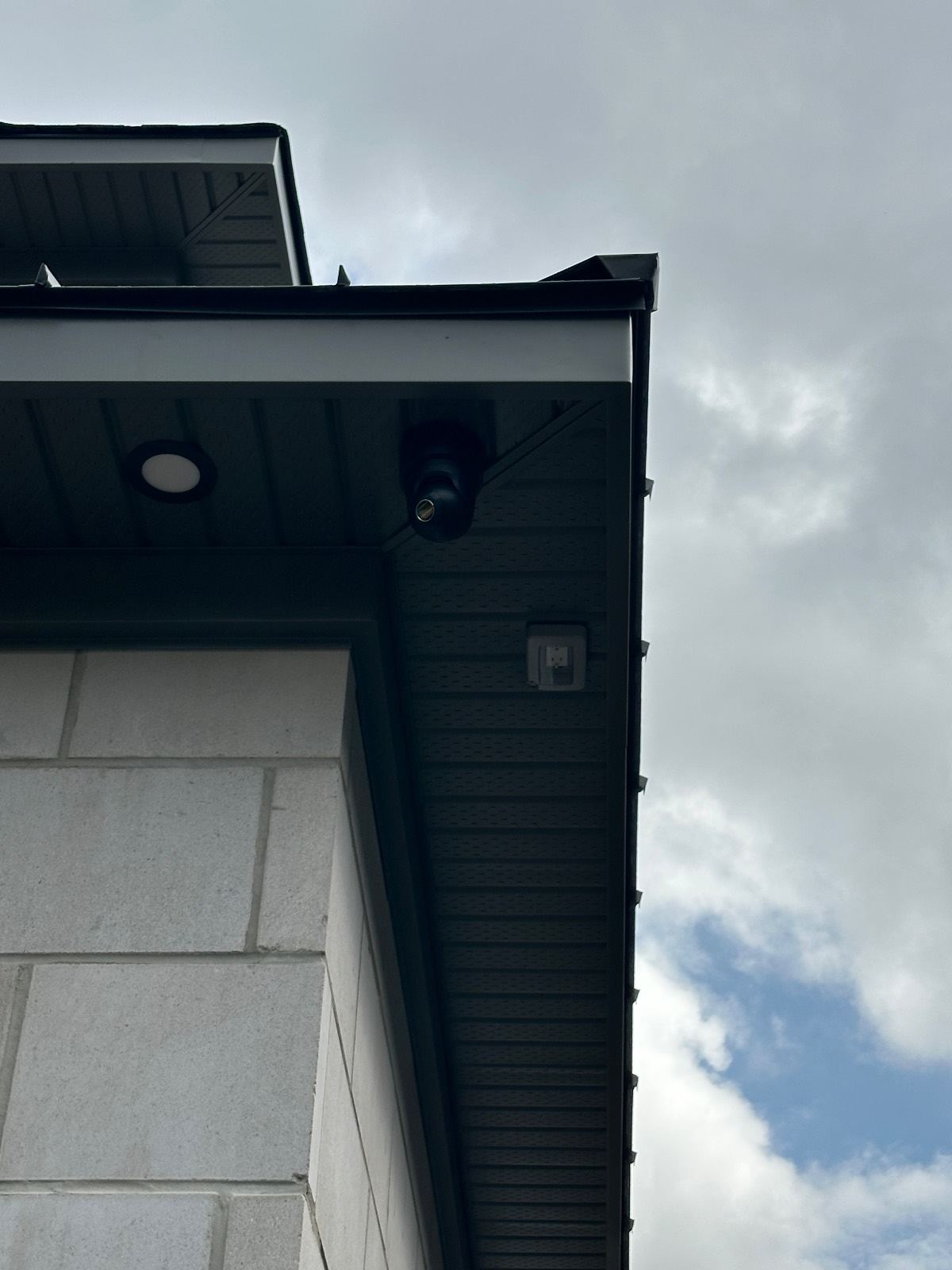 Turret camera tucked into a soffit corner