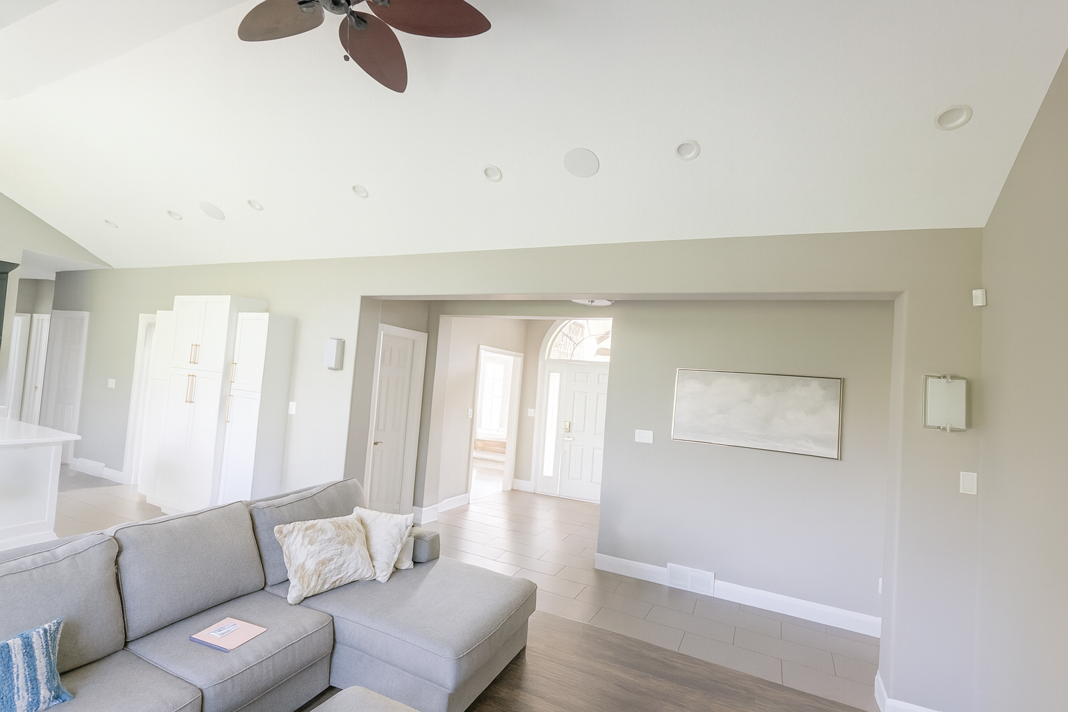 Living room with multiple in-ceiling speakers