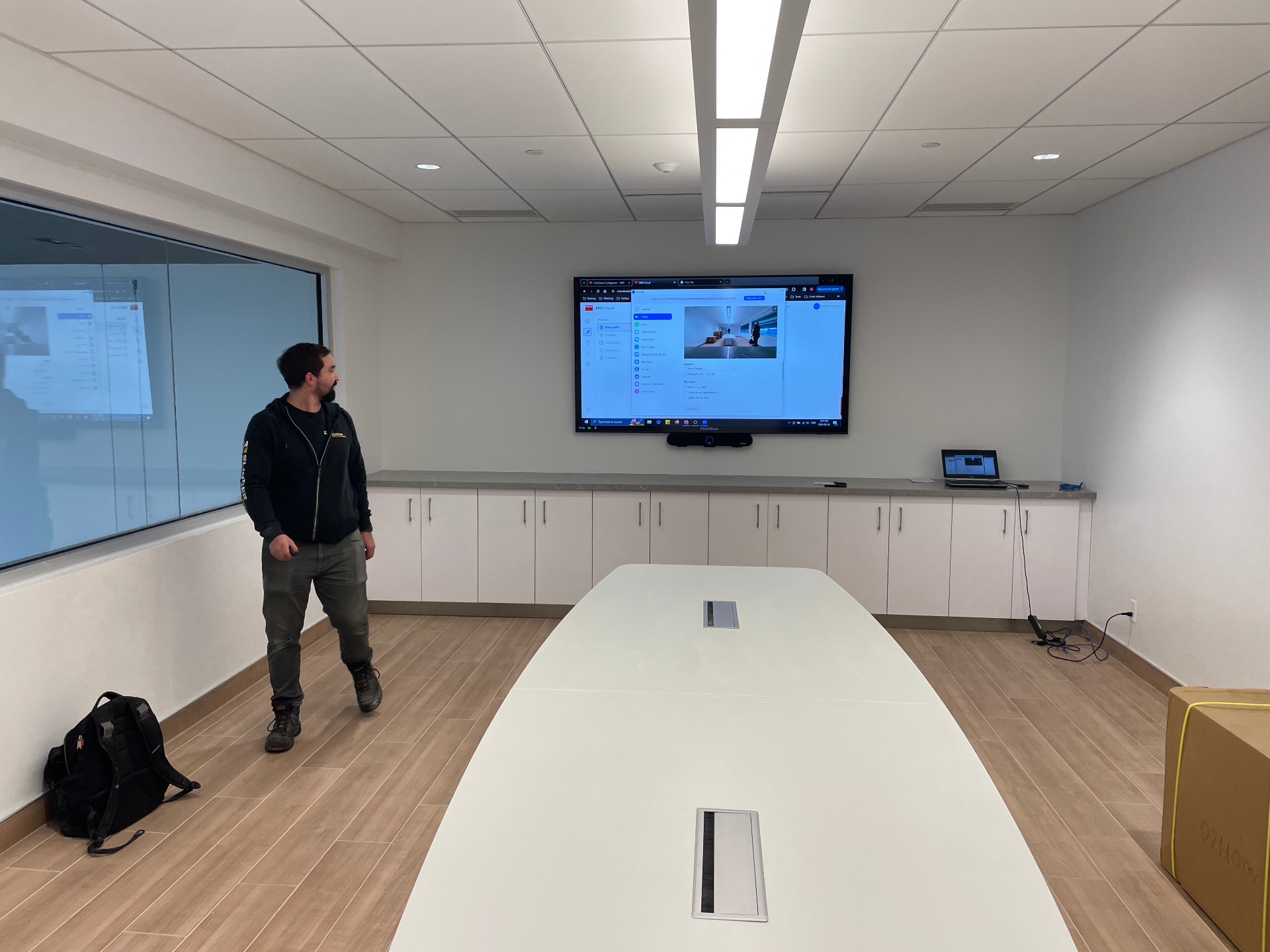 Boardroom with conferencing display and ClickShare